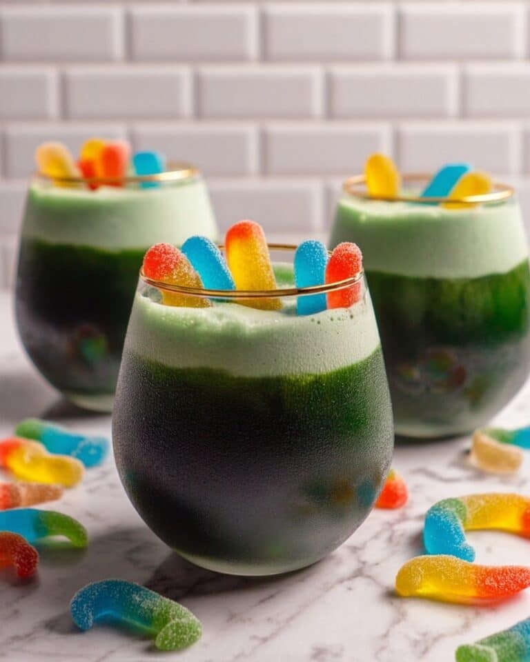 Halloween Toxic Waste Punch with Green Foam and Gummy Worms Recipe
