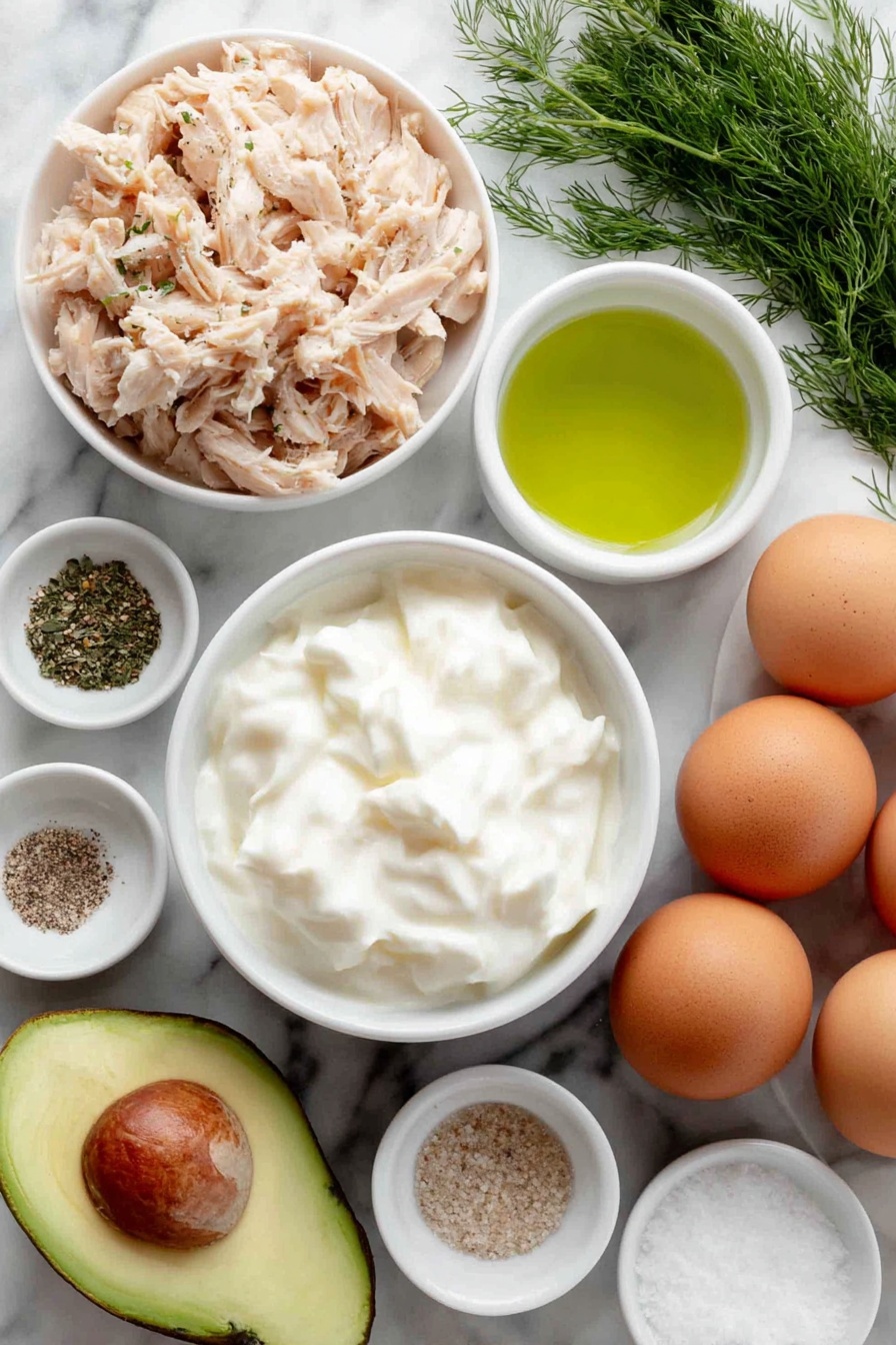 Healthy Greek Yogurt Avocado Chicken Salad, healthy chicken salad, Greek yogurt chicken salad, avocado chicken salad, quick healthy lunch - Flat lay of a small pile of shredded cooked chicken, a ripe medium avocado halved to show creamy green flesh and large seed, a small white ceramic bowl filled with thick plain Greek yogurt, a few sprigs of fresh dill, a small white ceramic bowl containing bright green lime juice, a small white ceramic bowl holding fine sea salt, a small white ceramic bowl with ground black pepper, a small white ceramic bowl with onion powder, a small white ceramic bowl with garlic powder, whole uncracked brown eggs arranged neatly aside, all arranged in perfect symmetry on a clean white marble surface, soft natural light, photo taken with an iPhone, professional food photography style, fresh ingredients, white ceramic bowls, no bottles, no duplicates, no utensils, no packaging --ar 2:3 --v 7 --p m7354615311229779997