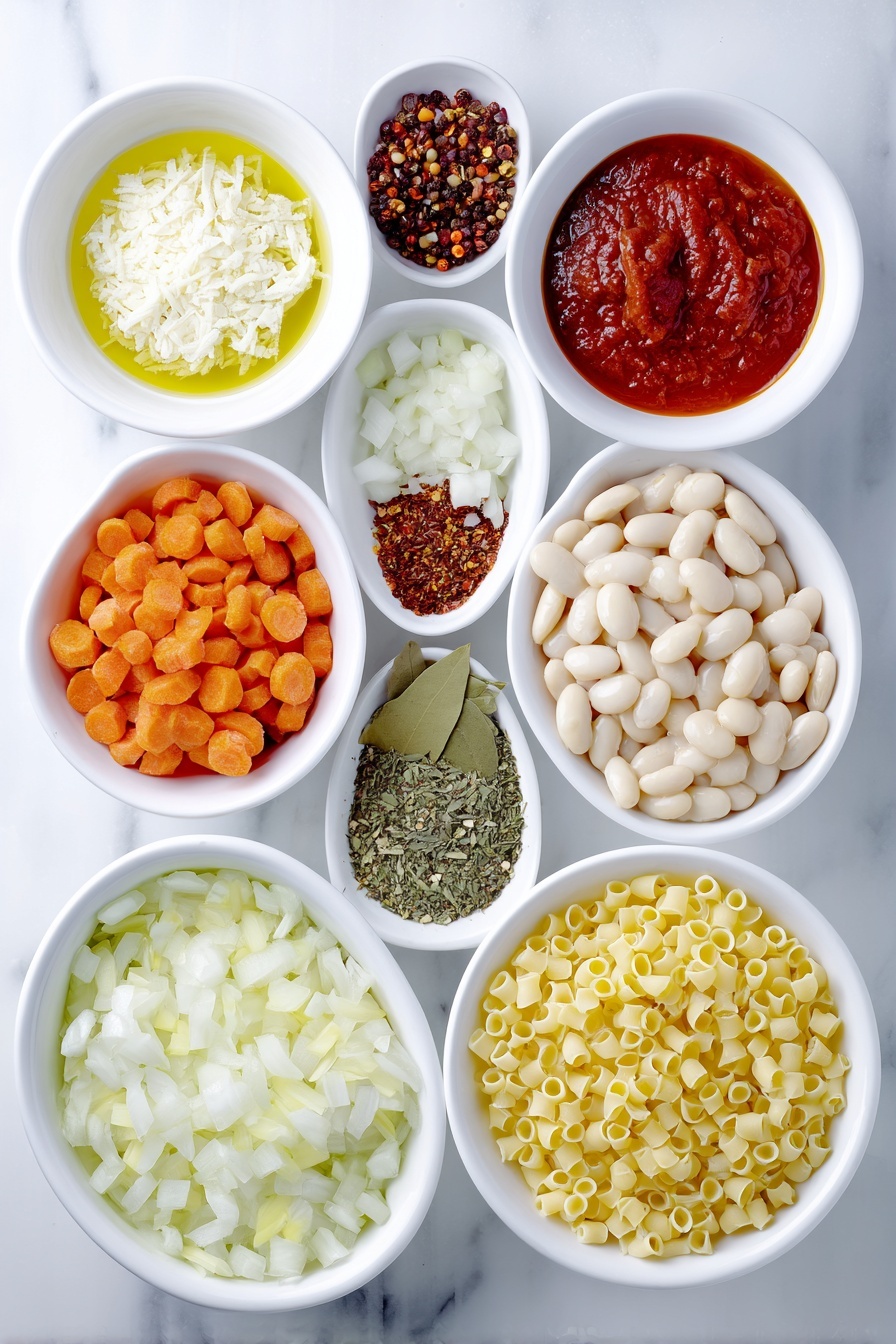 Comforting Pasta Fagioli Soup, Italian bean and pasta soup, hearty pasta and bean recipe, cozy Italian comfort food, easy Pasta Fagioli soup - Flat lay of a small white ceramic bowl of extra virgin olive oil, a small white ceramic bowl of diced fresh onion, a small white ceramic bowl of minced garlic cloves, a small white ceramic bowl of quartered fresh carrots, a small white ceramic bowl of rinsed and drained cannellini beans, a small white ceramic bowl of smooth tomato sauce, a single dried bay leaf, small piles of dried basil, dried parsley, dried oregano, black pepper, and red pepper flakes arranged neatly, a small white ceramic bowl of low sodium vegetable broth, a small white ceramic bowl of clear water, and a small white ceramic bowl of dry ditalini pasta, all ingredients fresh and natural, placed on a clean white marble surface, soft natural light, photo taken with an iPhone, professional food photography style, fresh ingredients, white ceramic bowls, no bottles, no duplicates, no utensils, no packaging --ar 2:3 --v 7 --p m7354615311229779997