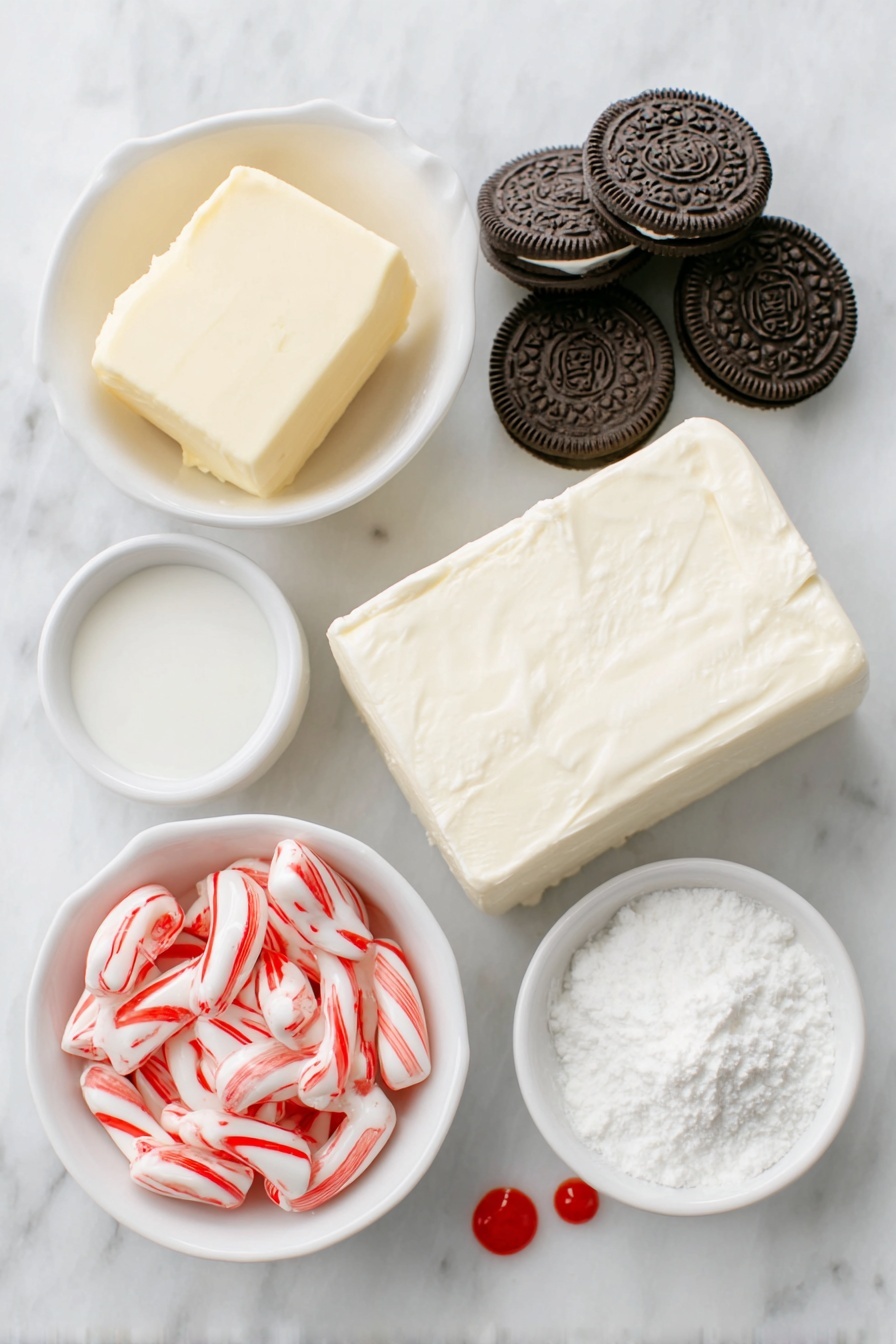 No Bake Peppermint Pie, peppermint dessert, easy holiday desserts, festive no-bake pies, Christmas peppermint treat - Flat lay of a small pile of whole Oreos with visible cream filling, a handful of individually unwrapped red and white peppermint candy cane kisses, a small white ceramic bowl with melted unsalted butter, a block of full-fat cream cheese with smooth edges, a small white bowl filled with powdered sugar, a small white bowl of heavy cream, another small white bowl holding a clear vanilla extract liquid, a small white bowl with peppermint extract liquid, two small drops of vivid red food coloring on the white surface, all arranged symmetrically and proportionally in balance, placed on a clean white marble surface, soft natural light, photo taken with an iPhone, professional food photography style, fresh ingredients, white ceramic bowls, no bottles, no duplicates, no utensils, no packaging --ar 2:3 --v 7 --p m7354615311229779997