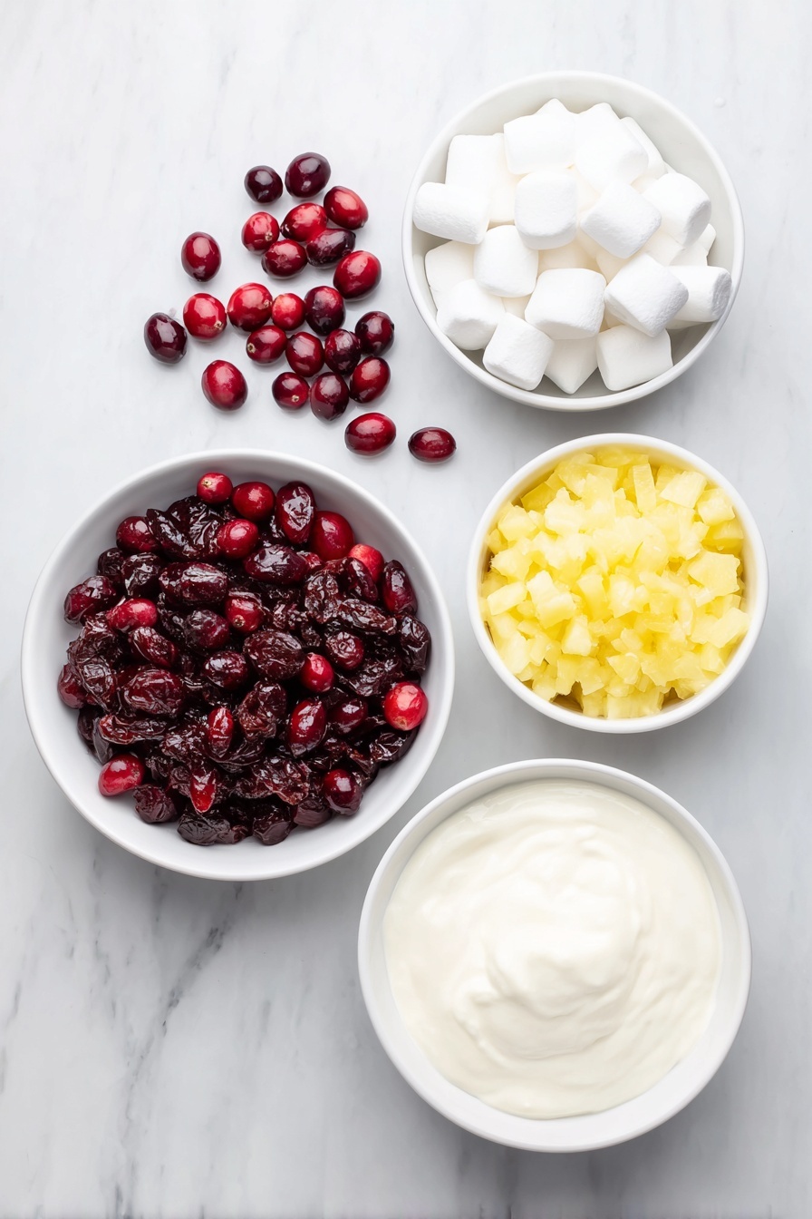 Cranberry Fluff Salad, holiday cranberry salad, creamy cranberry side dish, festive fruit salad, easy holiday side dish - Flat lay of fresh whole cranberries scattered in a small pile, a small white ceramic bowl filled with granulated sugar, a small white ceramic bowl holding bright yellow crushed pineapple pieces, a small pile of soft white mini-marshmallows, and a small white ceramic bowl of thick heavy cream placed alongside, all arranged symmetrically on a clean white marble surface, soft natural light, photo taken with an iPhone, professional food photography style, fresh ingredients, white ceramic bowls, no bottles, no duplicates, no utensils, no packaging --ar 2:3 --v 7 --p m7354615311229779997