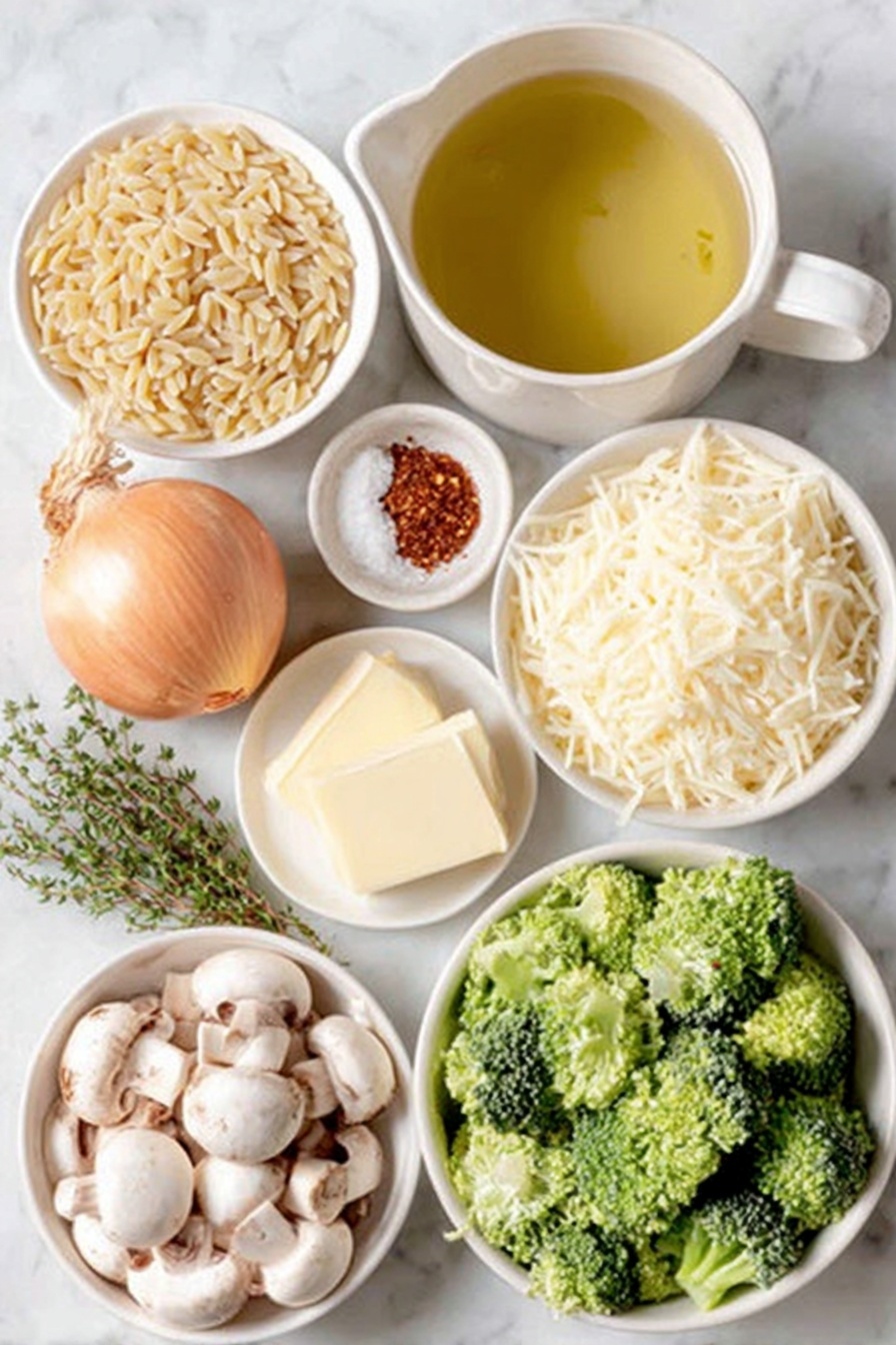 Cheesy Broccoli Orzo Bake, easy cheesy broccoli pasta, healthy broccoli casserole, creamy baked orzo, quick weeknight dinner - Flat lay of a small white ceramic bowl of extra virgin olive oil, a whole yellow onion peeled with top and root ends visible, a small white ceramic bowl filled with roughly chopped fresh white mushrooms, two tablespoons of salted butter on a simple white ceramic dish, a small mound of dry orzo pasta scattered neatly, a small white ceramic bowl with fresh green thyme leaves, a small white ceramic bowl of clear vegetable broth, a small white ceramic bowl holding dry white wine, a heap of bright green broccoli florets, a fresh glossy bay leaf, a small white ceramic bowl with a fine white powder of garlic powder, a small white ceramic bowl with vibrant red cayenne pepper powder, half a lemon with fresh zest visible, a small white ceramic bowl of whole milk, a small white ceramic bowl with shredded sharp cheddar cheese, a small white ceramic bowl with grated asiago cheese, a few sprigs of fresh basil, all arranged with perfect symmetry and balanced proportions, placed on a clean white marble surface, soft natural light, photo taken with an iPhone, professional food photography style, fresh ingredients, white ceramic bowls, no bottles, no duplicates, no utensils, no packaging --ar 2:3 --v 7 --p m7354615311229779997