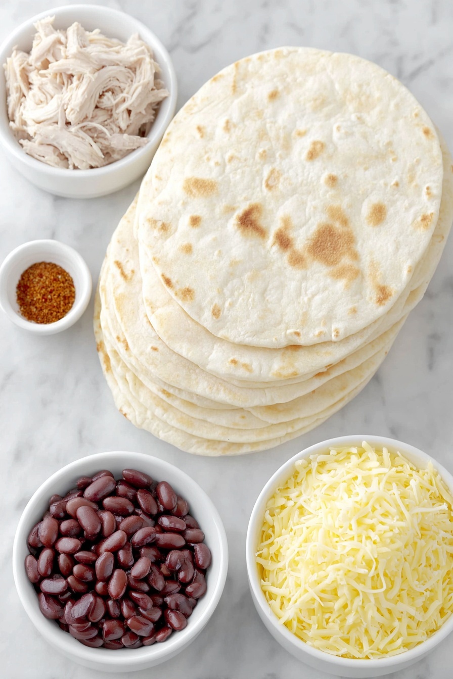 Burrito Ring with Chicken and Cheese, chicken burrito ring, cheesy baked burrito ring, festive appetizer recipes, party dish ideas - Flat lay of soft flour tortillas stacked in a neat pile, a small mound of cooked shredded chicken showing tender texture, a handful of golden shredded Mexican blend cheese, a white ceramic bowl filled with smooth refried beans, another small white bowl containing taco seasoning with vibrant red and orange tones, and a clean white ceramic bowl holding shredded queso quesadilla cheese, all arranged symmetrically and balanced, placed on a clean white marble surface, soft natural light, photo taken with an iPhone, professional food photography style, fresh ingredients, white ceramic bowls, no bottles, no duplicates, no utensils, no packaging --ar 2:3 --v 7 --p m7354615311229779997