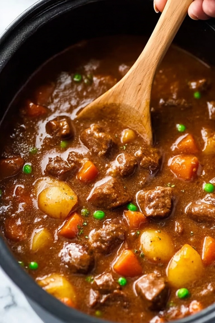 Slow Cooker Beef Stew with Red Wine, Beef Stew with Red Wine, Crockpot Beef Stew, Hearty Beef Stew Recipe, Easy Beef Stew with Wine - A close-up view of a black pot filled with thick brown stew that has a shiny, smooth surface. Inside the stew, there are many chunks of tender-looking brown meat scattered throughout. Bright orange carrot pieces, small round yellow potatoes, and green peas are mixed evenly in the stew, adding color contrast. A woman's hand is holding a wooden spoon stirring the stew, lifting some pieces of meat and vegetables above the surface. The background is a white marbled texture. Photo taken with an iphone --ar 2:3 --v 7