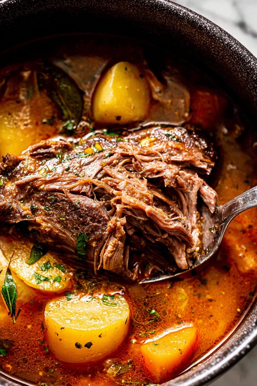 Braised Pork Shoulder with Apples, Pork Shoulder recipes, Slow cooker pork dishes, Apple pork recipes, Comfort food pork dishes - The image shows a close-up of a rich stew in a dark pot placed on a white marbled surface. In the stew, there is a large piece of brown, cooked meat with textures of pulled, soft fibers, resting in the middle. Around the meat, there are orange-brown sauce layers with some shiny, smooth textures from the broth. Mixed in the stew are yellowish chunks of potatoes and green herbs scattered on top, adding a fresh look. A silver fork is pulling some meat from the main piece. The overall colors are warm with browns, oranges, yellows, and greens, creating a hearty, home-cooked style appearance. photo taken with an iphone --ar 2:3 --v 7