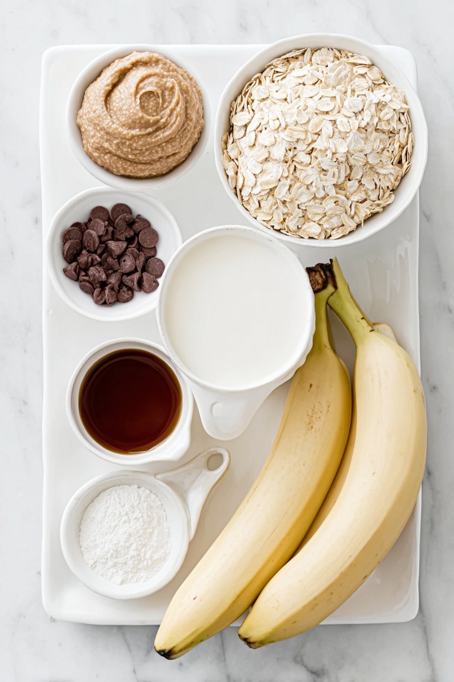 Healthy Banana Chocolate Oat Bake, healthy breakfast recipes, nutritious baked oats, chocolate banana breakfast, quick healthy breakfast - Flat lay of two ripe bananas, a small mound of cashew butter on a white ceramic plate, a small white bowl filled with unsweetened almond milk, a small white bowl holding pure maple syrup, a small white bowl containing vanilla extract, a neat pile of rolled oats, a small white bowl with unsweetened cocoa powder, a small white bowl of baking powder, a small pinch of salt on a white ceramic dish, and a few chocolate chips scattered on a white ceramic plate, all arranged in perfect symmetry, placed on a clean white marble surface, soft natural light, photo taken with an iPhone, professional food photography style, fresh ingredients, white ceramic bowls, no bottles, no duplicates, no utensils, no packaging --ar 2:3 --v 7 --p m7354615311229779997