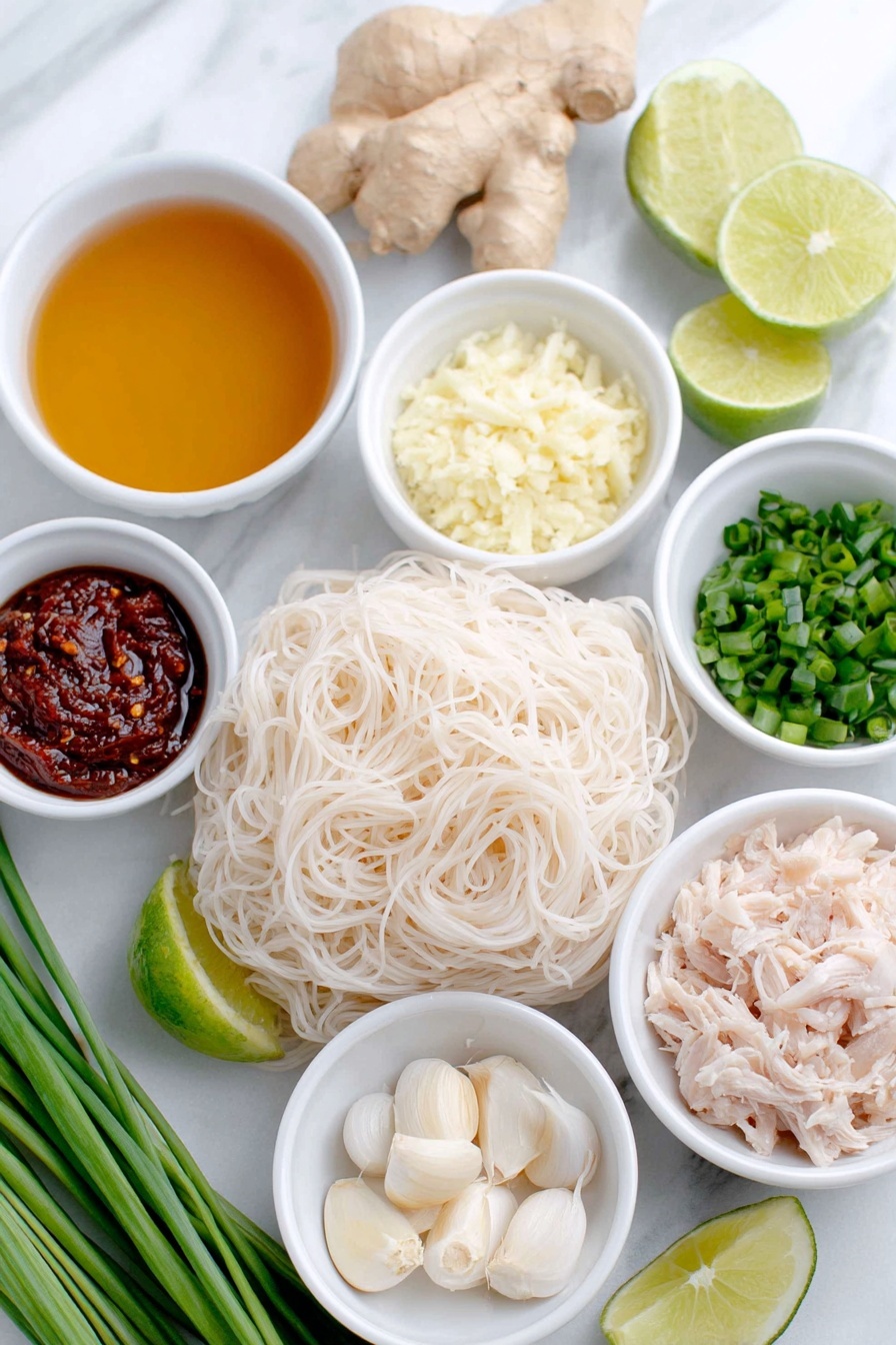 Thai Chicken Curry Soup, Thai chicken coconut soup, easy Thai curry soup, spicy chicken coconut soup, quick Thai soup recipes - Flat lay of a small white ceramic bowl of golden olive oil, a small white ceramic bowl with finely chopped pale yellow onion, a small white ceramic bowl holding grated fresh ginger with light beige fibrous texture, three whole uncracked garlic cloves with smooth white skins, a small white ceramic bowl filled with vibrant deep red Thai curry paste, a small white ceramic bowl of clear chicken broth with a warm amber tint, a small white ceramic bowl with fresh pale green lime juice, an uncooked bundle of thick 3mm rice noodles with delicate white translucent strands, a small white ceramic bowl of creamy white coconut milk, a small white ceramic bowl with shredded cooked chicken showing tender white and light brown pieces, a small pile of fresh bright green torn basil leaves, a small pile of chopped fresh vibrant green cilantro, a small pile of chopped fresh green scallions, and a few wedges of fresh lime with bright green rind and pale juicy flesh arranged in perfect symmetry, all placed on a clean white marble surface, soft natural light, photo taken with an iPhone, professional food photography style, fresh ingredients, white ceramic bowls, no bottles, no duplicates, no utensils, no packaging --ar 2:3 --v 7 --p m7354615311229779997