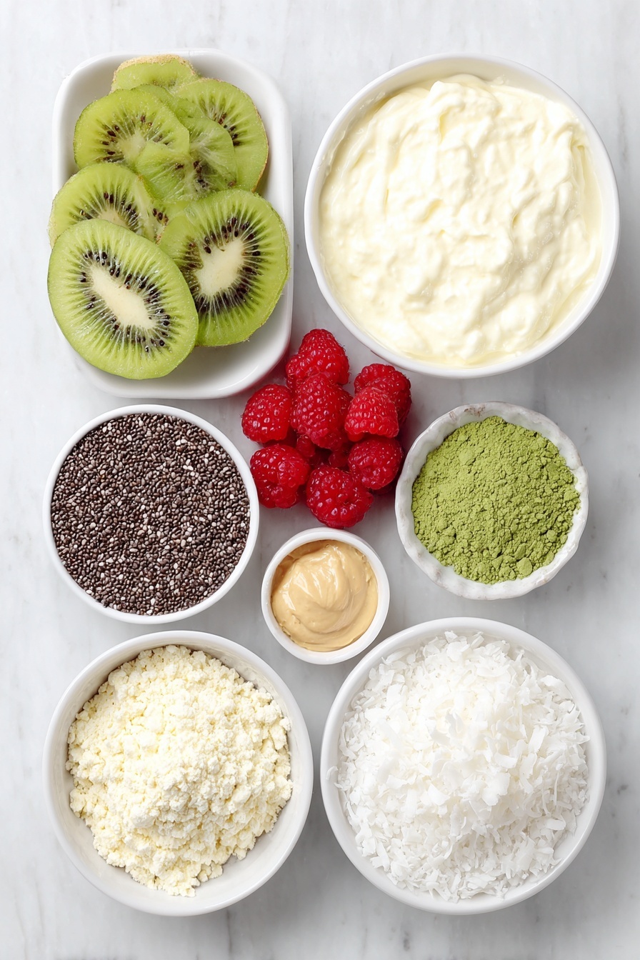 Matcha Protein Chia Pudding, healthy matcha chia pudding, protein-packed breakfast recipes, quick nutritious snacks, vegan chia pudding ideas - Flat lay of fresh creamy nonfat Greek yogurt in a simple white ceramic bowl, a small white bowl of smooth plant-based milk, a neat pile of glossy black chia seeds on the white surface, a small mound of vibrant green matcha powder, a small white bowl with light beige vanilla extract, a half scoop of fine vanilla whey protein powder shaped into a small mound, a few plump red raspberries, a couple of bright sliced strawberries, a few vibrant green kiwi slices arranged naturally, a small white bowl with creamy almond butter, a small white bowl filled with white coconut flakes, all perfectly arranged with balanced spacing and symmetry, placed on a clean white marble surface, soft natural light, photo taken with an iPhone, professional food photography style, fresh ingredients, white ceramic bowls, no bottles, no duplicates, no utensils, no packaging --ar 2:3 --v 7 --p m7354615311229779997