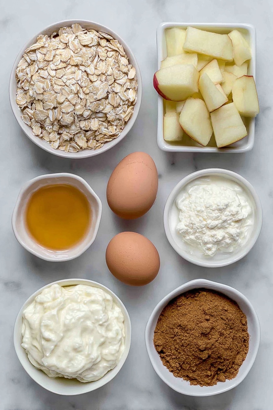 Healthy Apple Oatmeal Cake, healthy breakfast cake, gluten-free apple cake, wholesome oatmeal cake, easy apple oatmeal dessert - Flat lay of a small pile of rolled oats, a large peeled apple chopped into chunks, a few whole brown eggs with clean shells, a small white ceramic bowl filled with golden honey, another small white bowl containing creamy yogurt, a small white bowl with softened butter, a neat mound of ground cinnamon powder, a small heap of fine baking powder, and a small heap of baking soda, arranged symmetrically on a clean white marble surface, soft natural light, photo taken with an iPhone, professional food photography style, fresh ingredients, white ceramic bowls, no bottles, no duplicates, no utensils, no packaging --ar 2:3 --v 7 --p m7354615311229779997