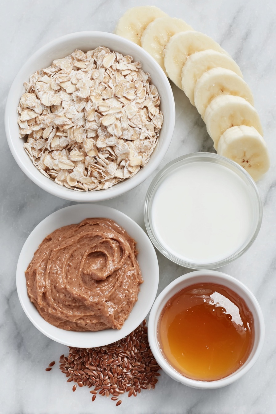 Peanut Butter Banana Overnight Oats, healthy overnight oats, quick breakfast ideas, easy make-ahead breakfast, nutritious breakfast recipes - Flat lay of a small mound of rolled oats, a teaspoon of whole flax seeds, a light dusting of ground cinnamon beside a small white ceramic bowl of milk, a small white ceramic bowl filled with amber maple syrup, a dollop of creamy peanut butter on the side, and a perfectly ripe half banana sliced into neat pieces arranged next to the ingredients, all placed on a clean white marble surface, soft natural light, photo taken with an iPhone, professional food photography style, fresh ingredients, white ceramic bowls, no bottles, no duplicates, no utensils, no packaging --ar 2:3 --v 7 --p m7354615311229779997