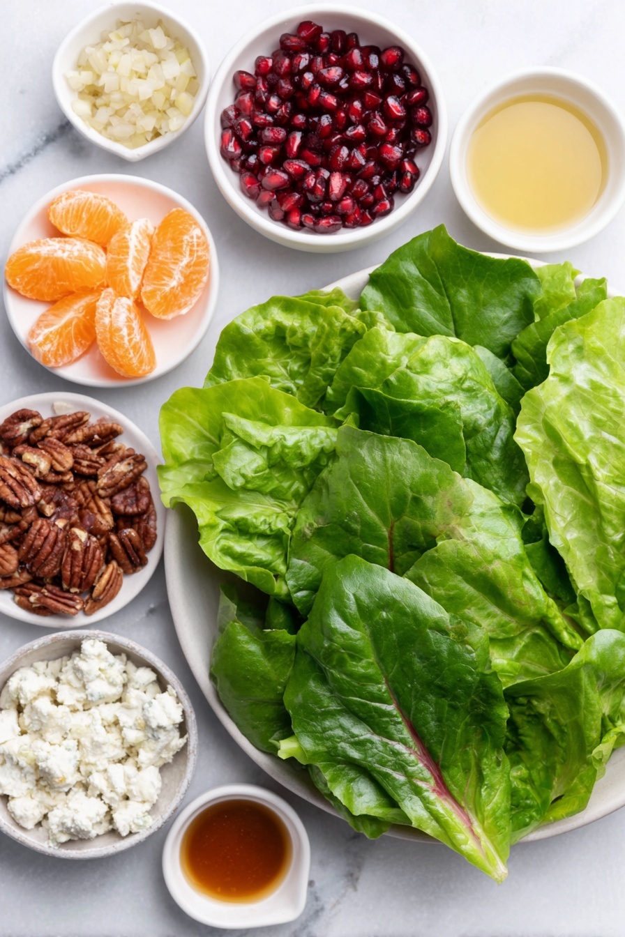 Winter Salad with Citrus and Pomegranate, citrus winter salad, pomegranate salad recipe, healthy winter salad, easy citrus salad - Flat lay of fresh mixed spring greens with vibrant green leaves, a small white bowl of bright orange mandarin segments, a small white bowl filled with ruby red pomegranate seeds, crumbled white feta cheese on a simple white ceramic plate, roughly chopped glossy candied pecans scattered neatly nearby, and four small white bowls containing golden olive oil, amber honey, smooth pale Dijon mustard, and light amber apple cider vinegar, along with a small pile of minced shallot on a white ceramic dish, all arranged symmetrically and balanced, placed on a clean white marble surface, soft natural light, photo taken with an iPhone, professional food photography style, fresh ingredients, white ceramic bowls, no bottles, no duplicates, no utensils, no packaging --ar 2:3 --v 7 --p m7354615311229779997